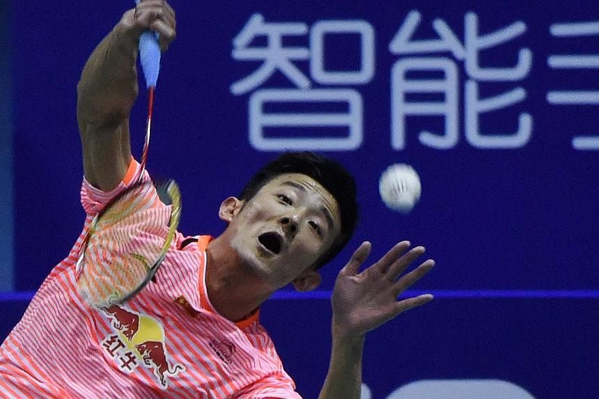 China's Chen Long hits a return against Indonesia's Jonatan Christie during their men's singles semi-final match of the 2015 Sudirman Cup on May 16, 2015. -- PHOTO: AFP&nbsp;