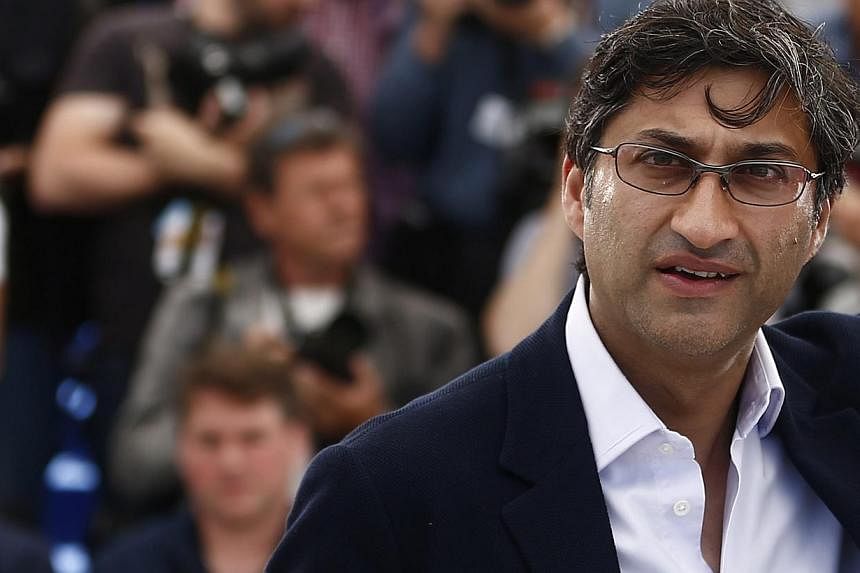 British director Asif Kapadia poses during the photocall for Amy at the 68th annual Cannes Film Festival on May 16, 2015. -- PHOTO: EPA