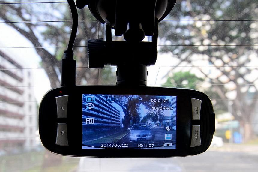 A community initiative called Vehicles on Watch helps to put drivers of cars with in-vehicle cameras in partnership with the police, to help raise neighbourhood safety. -- ST FILE PHOTO&nbsp;