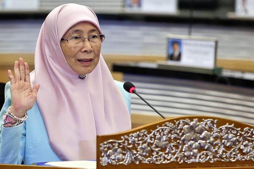 Newly appointed opposition leader Wan Azizah Wan Ismail (above) has pledged to to revive Malaysia's Pakatan Rakyat (PR) shadow cabinet during a press conference in Parliament on May 18, 2015. -- PHOTO: EPA