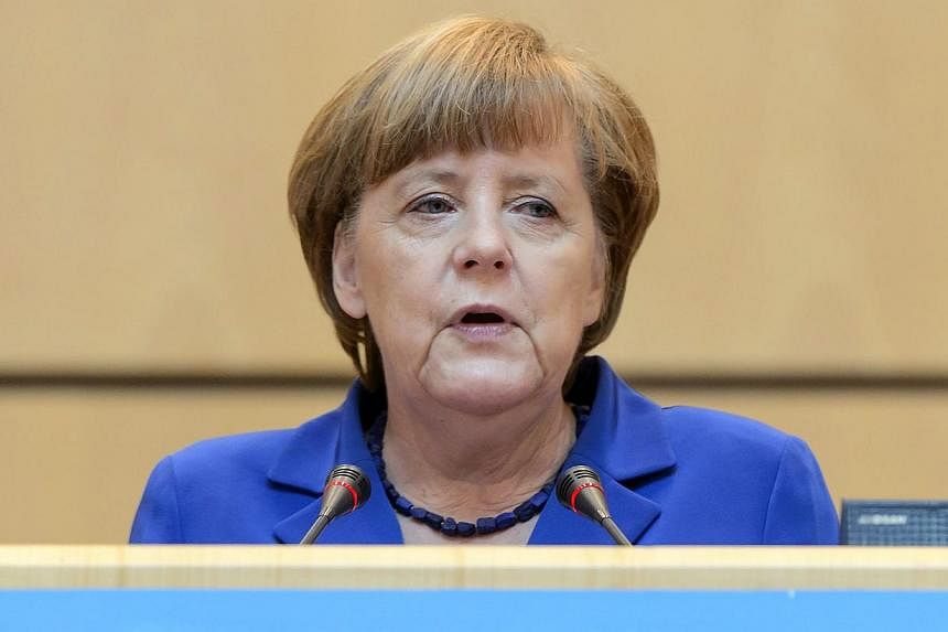 Merkel stressed the interconnectedness of global health systems, insisting all nations must work together to root out the problem of antimicrobial resistance. -- PHOTO: EPA