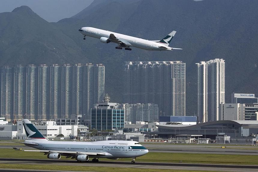 A Cathay Pacific Airways passenger plane takes off at the Hong Kong Airport in this Sept 11, 2013 file photo. The International Air Transport Association (Iata) said passenger terminals at several major airports in Asia, including those in Bangkok, H