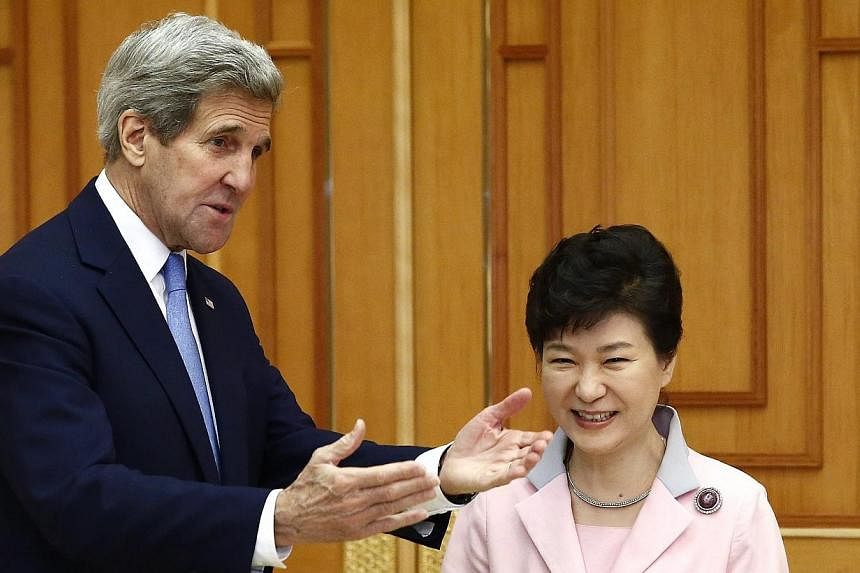 US Secretary of State John Kerry (left) talking to South Korean President Park Geun Hye at the Presidential Blue House in Seoul, South Korea on May 18, 2015. -- PHOTO: EPA
