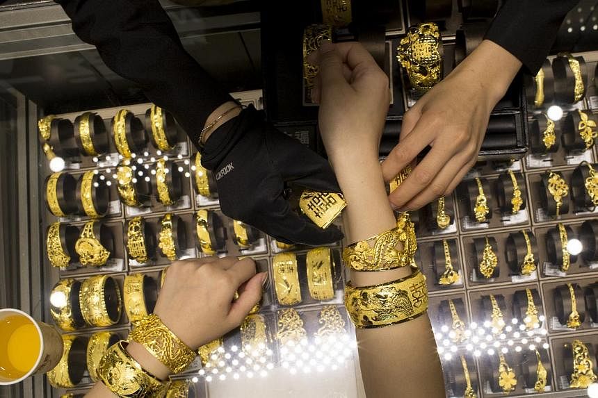 Phillip Futures investment analyst Howie Lee says gold prices are likely to pick up "in the very long run", especially as "global economic recovery ramps up jewellery demand in China and India".