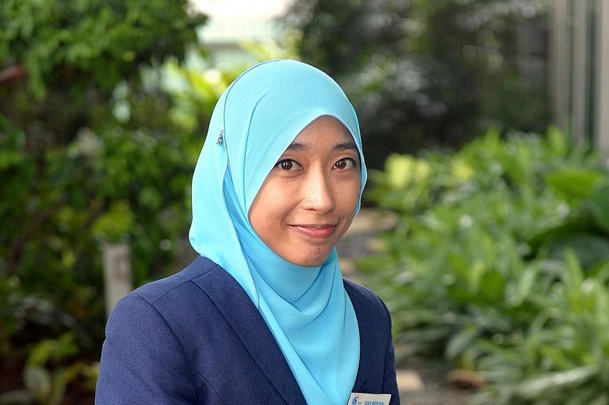 Ms Idah Mariyani, a librarian with the National Library Board (NLB), is among the 16 individuals and organisations to receive the Singapore Service Excellence Medallion (SSEM) award. -- PHOTO: BERITA HARIAN