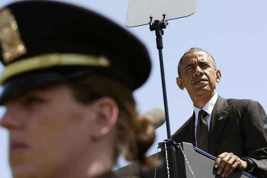 US President Barack Obama delivers remarks at the 34rd Annual National Peace Officers' Memorial Service on Capitol Hill in Washington, DC on May 15, 2015.&nbsp;Mr Obama plans to put in place new restrictions on the use of military equipment by police