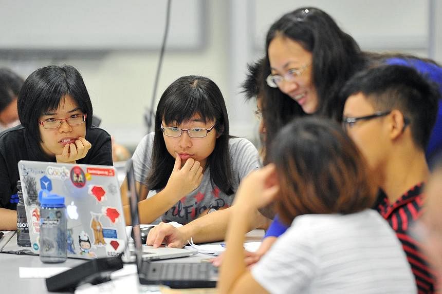 First-year undergraduates during a physics class at the Singapore University of Technology and Design (SUTD) on May 15, 2015. -- PHOTO: LIM YAOHUI FOR THE STRAITS TIMES