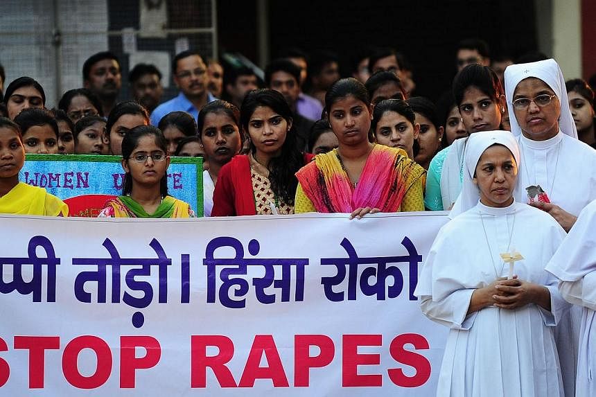 Participants in a peace rally and protest against the rape of a nun in Allahabad on March 16, 2015. -- PHOTO: AFP