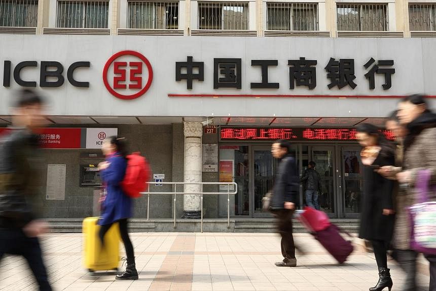 A businesswoman deposited 10.8 million yuan (S$2.3 million) at a branch of China's largest bank, but only 124 yuan (S$26.50) remained after most of it was transferred without her authorisation, state media reported. -- PHOTO: BLOOMBERG