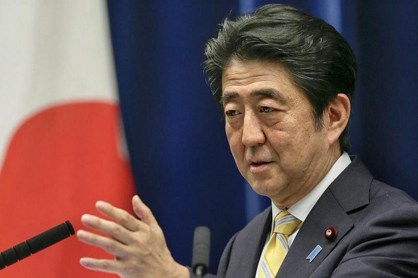 Japan's Prime Minister Shinzo Abe speaking at a news conference at his official residence in Tokyo, Japan, on May 14, 2015. -- PHOTO: EPA