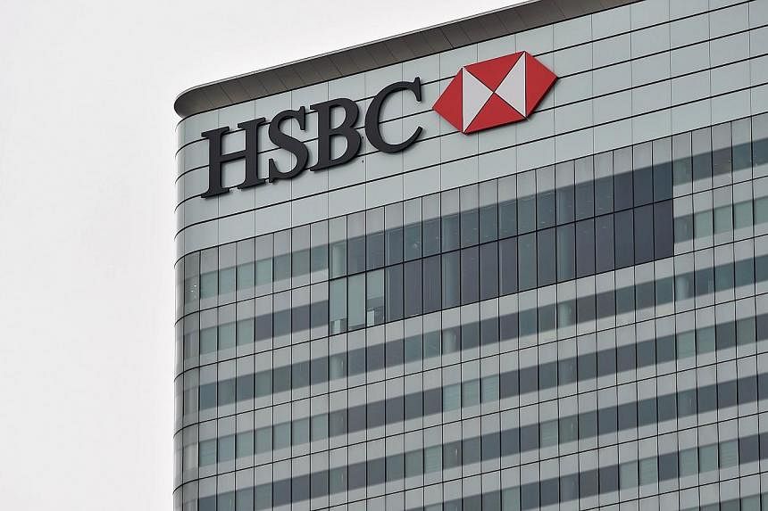 HSBC Holdings will charge banking customers to hold some European currencies given the region's low interest-rate environment. -- PHOTO: AFP