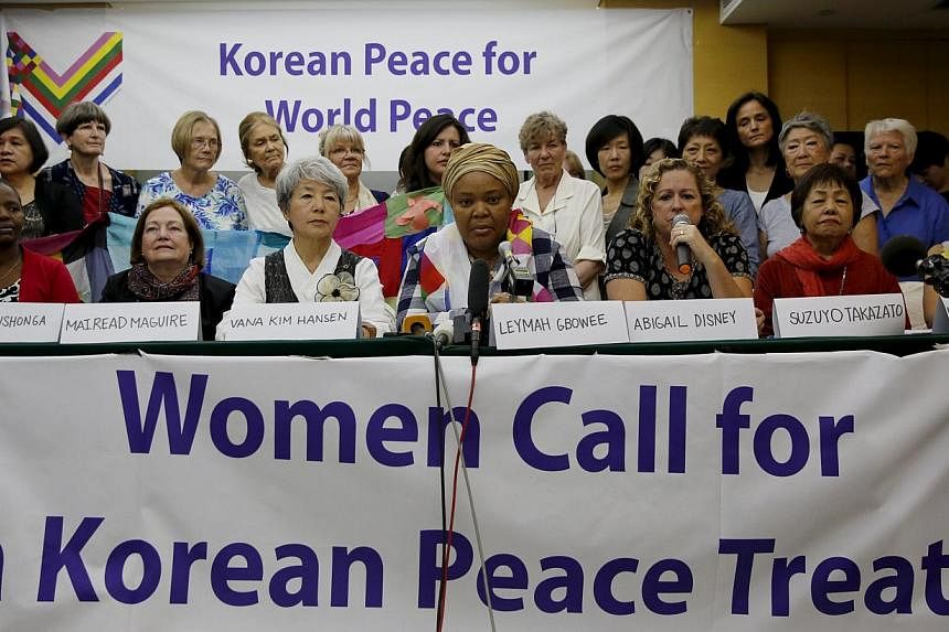 Members of the WomenCrossDMZ group attending a news conference before they leave for North Korea's capital Pyongyang, at a hotel in Beijing, China, on May 19, 2015. -- PHOTO: REUTERS&nbsp;