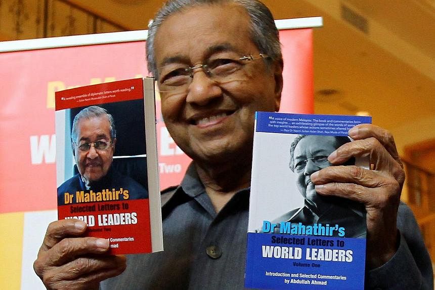 Dr Mahathir Mohamad with his new book Selected Letters To World Leaders. The former Malaysian premier has been PM Najib Razak's harshest critic and has campaigned to remove him as Umno president.