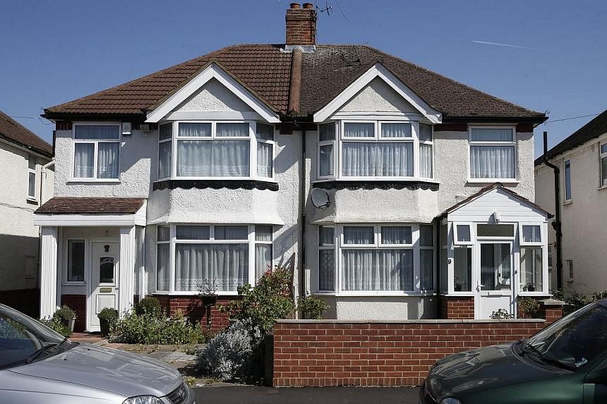 A semi-detached house, (right), the registered address of Nav Sarao Futures Ltd, a trading company operated by Navinder Singh Sarao, is pictured in Hounslow, west of London on April 22, 2015. -- PHOTO: AFP