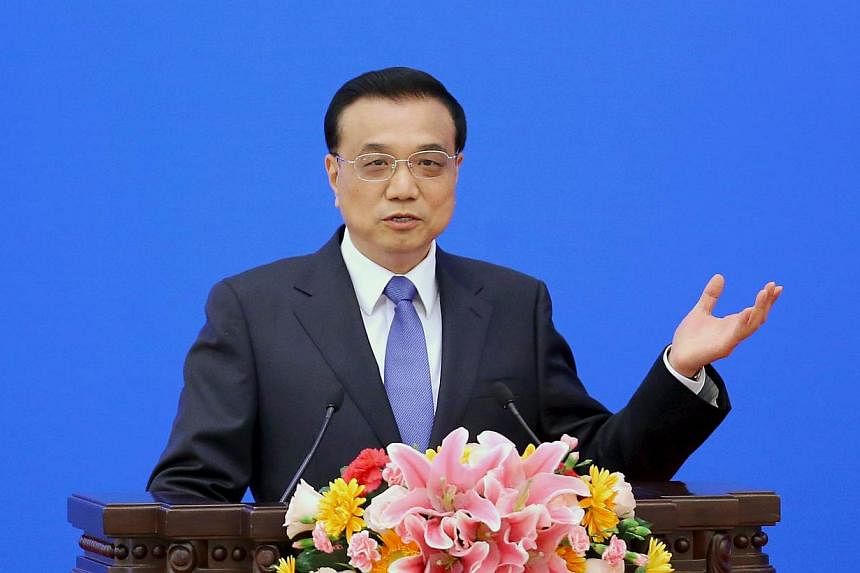 Chinese Premier Li Keqiang will push trade, finance and investment deals worth tens of billion of dollars on Tuesday to help Brazil upgrade its dilapidated infrastructure and boost a slumping economy. -- PHOTO: REUTERS