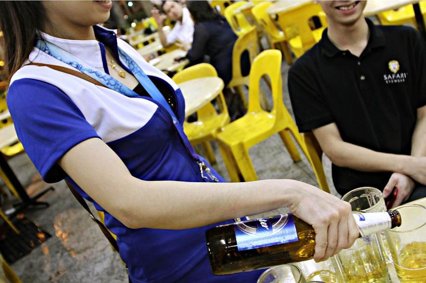 Beer promoters can no longer work at hawker centres The Straits Times