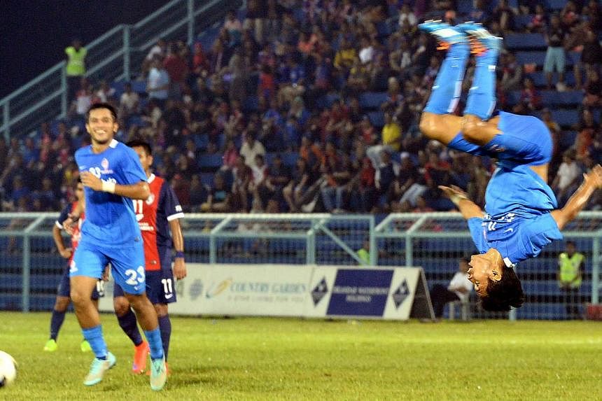 Muhammad Nazrul Nazari celebrates after scoring LionsXII's second goal against Johor Darul Takzim II (JDTII) in the second Leg of the Malaysia FA Cup quarter-final match held at the Corporation Stadium in Pasir Gudang, Johor on April 22, 2015. -- PHO