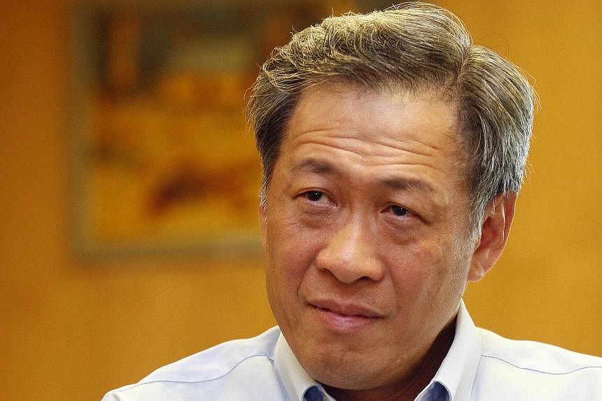 Asean and China should "expeditiously" ink an agreement that is aimed at easing the tensions in the South China Sea, urged Singapore Defence minister Ng Eng Hen. -- PHOTO: ST FILE