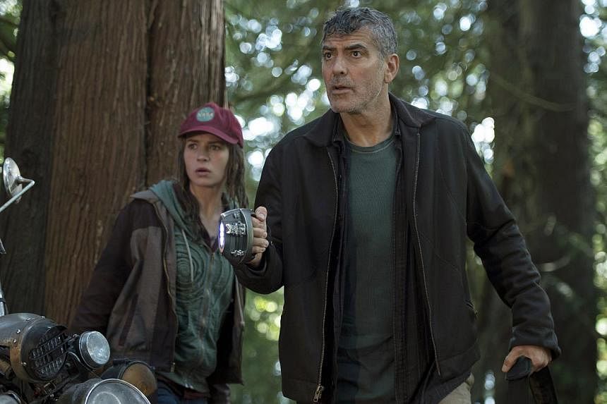 Clooney with Tomorrowland's co-star Britt Robertson (above).