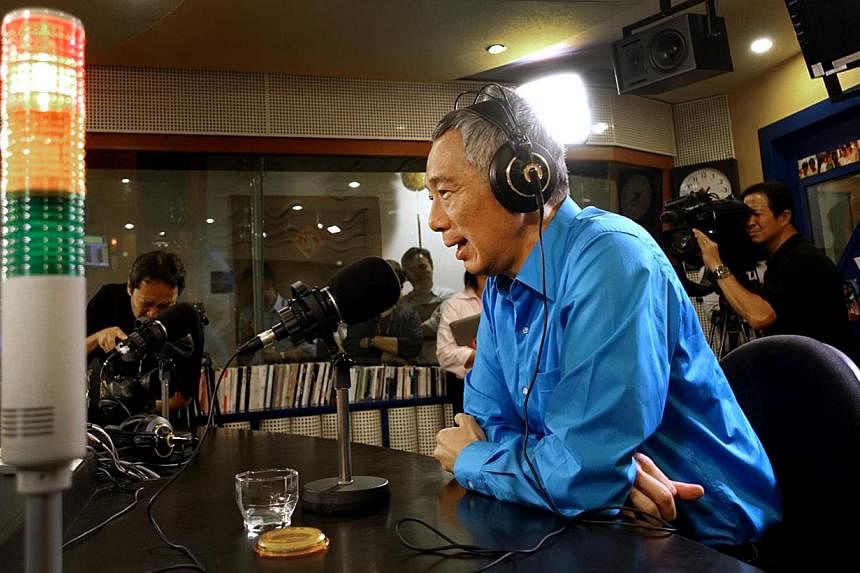 PM Lee Hsien Loong speaking on Capital 95.8 FM's live weekly programme On Air With Minister last night, where he urged Singaporeans not to take their votes lightly.