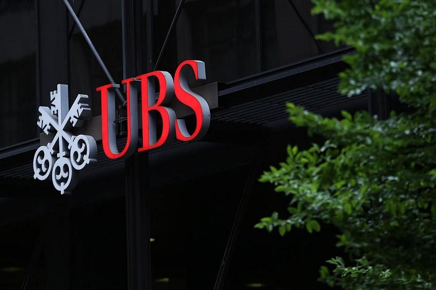Swiss bank UBS said its main unit will plead guilty to fraud in the US for manipulating benchmark interest rates and pay US$203 million (S$271 million) in fresh fines after the bank violated an agreement that had allowed it to avoid prosecution. -- P