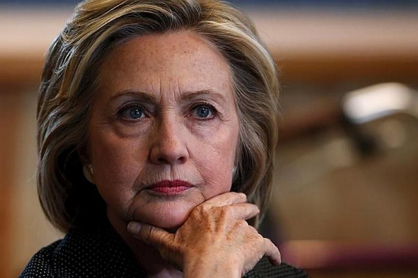 US presidential candidate Hillary Clinton listens to remarks at a roundtable campaign event with small businesses in Cedar Falls, Iowa, United States, May 19, 2015. -- PHOTO: REUTERS