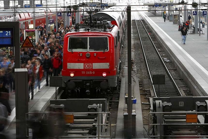 Passengers leave a train during a strike by the GdL train drivers union at the main train station in Munich, Germany, on May 20, 2015.&nbsp;Railways operator Deutsche Bahn (DB) said it cancelled two-thirds of long-distance passenger services on Wedne