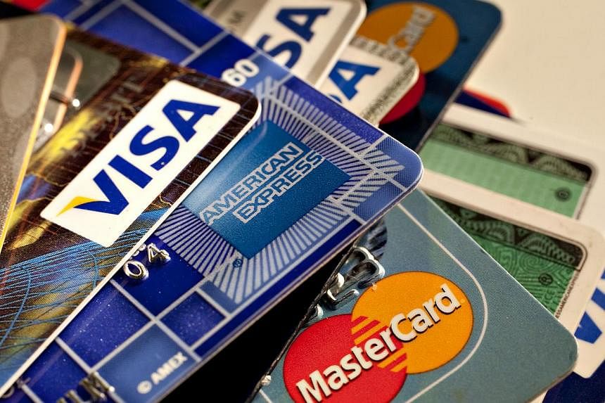 Tough new credit rules take effect in just a few days, but only a handful of heavily indebted people have sought help under a new scheme to cut their red ink. -- PHOTO:&nbsp;BLOOMBERG