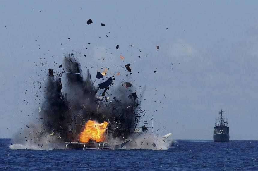 The Indonesian navy scuttles foreign fishing vessels caught fishing illegally in Indonesian waters near Bitung, North Sulawesi on May 20, 2015 in the is photo taken by Antara Foto.&nbsp;China on Thursday, May 21, expressed "serious concern" over the 