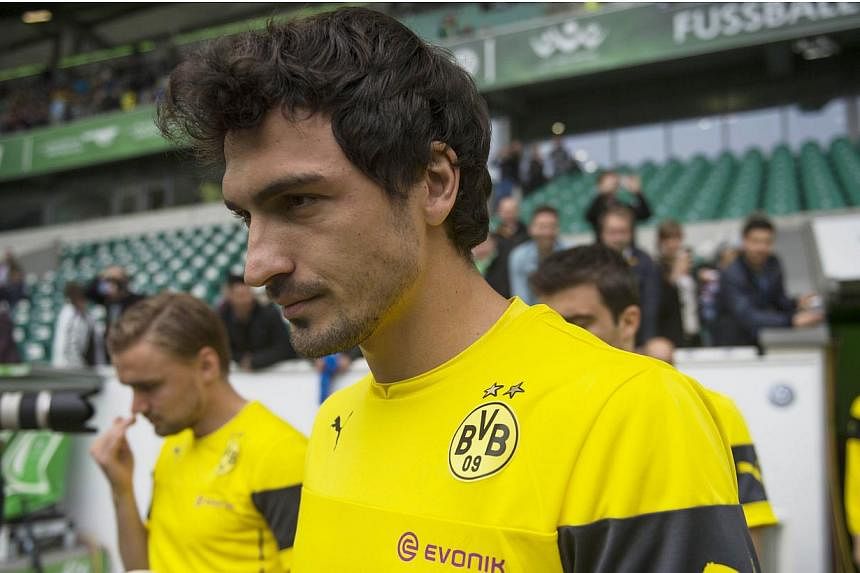 German defender Mats Hummels has confirmed he will play for Borussia Dortmund next season, according to a report on Thursday, May 21, 2015, ending speculation about a possible transfer to English Premier League side Manchester United. -- PHOTO: AFP
