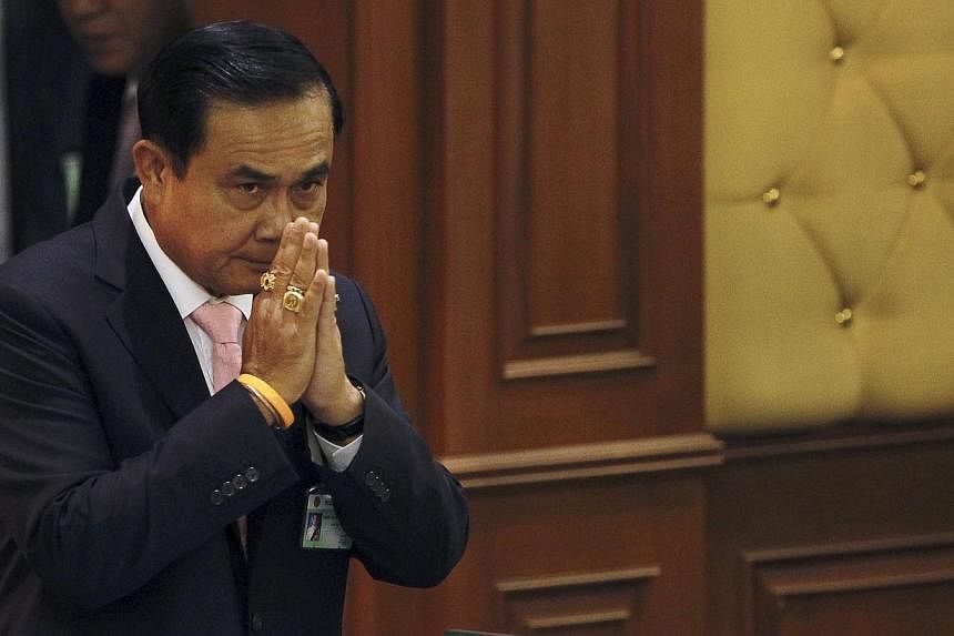 Thailand's Prime Minister Prayuth Chan-ocha gestures in a traditional greeting to National Legislative Assembly members at the parliament in Bangkok, Thailand on&nbsp;May 21, 2015. -- PHOTO: REUTERS