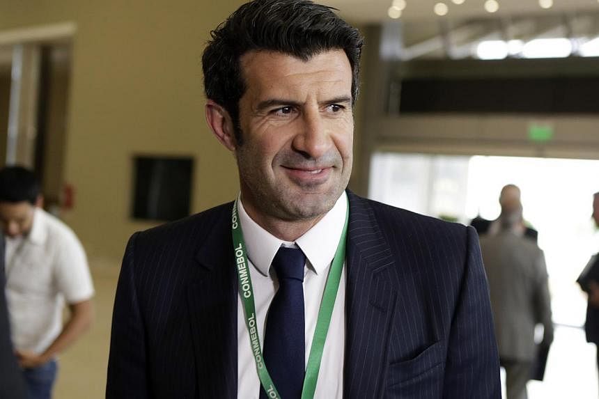 Former Portuguese international Luis Figo (above) withdrew from the race to succeed Sepp Blatter as Fifa president on Thursday, firing a bitter broadside at the election campaign. -- PHOTO: REUTERS
