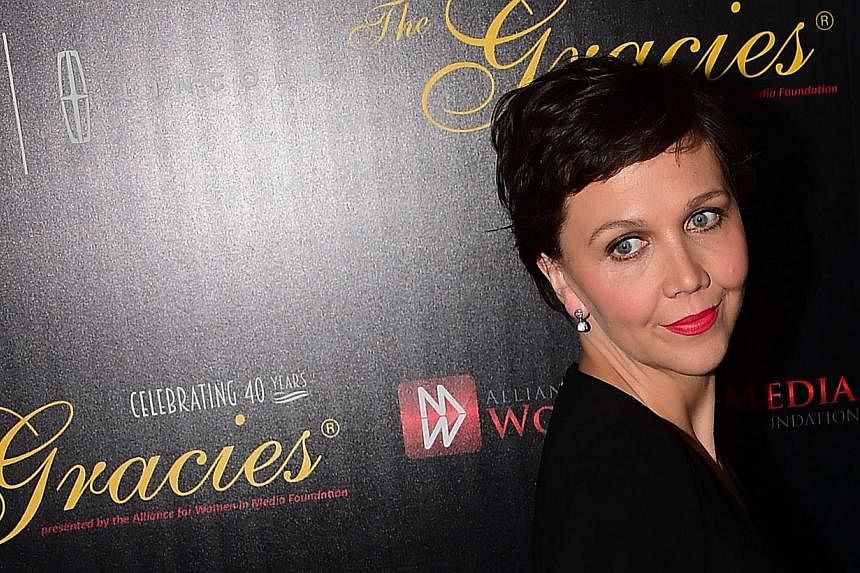 Oscar-nominated US actress Maggie Gyllenhaal was told she was too old at 37 to play the lover of a 55-year-old man, she said in comments published Thursday which went viral online. -- PHOTO: AFP