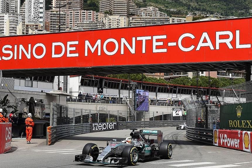 British driver Lewis Hamilton drives during the first practice session at the Monaco street circuit in Monte-Carlo on May 21, 2015, ahead of the Monaco Formula One Grand Prix. -- PHOTO: AFP&nbsp;