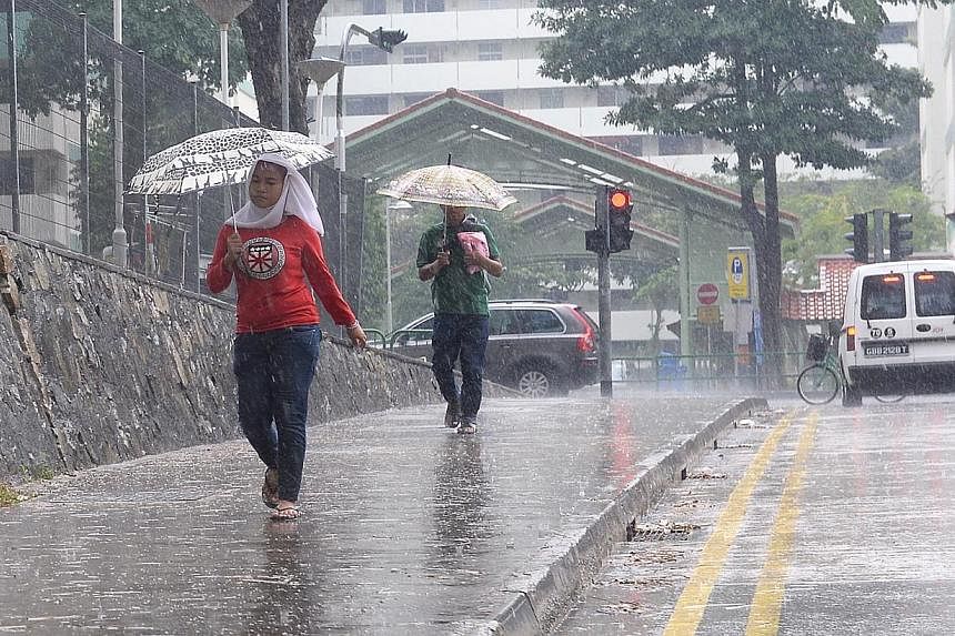 Singapore is likely to have more showers for the rest of this month, but the weather after that could become drier and hotter than usual. -- PHOTO: BERITA HARIAN