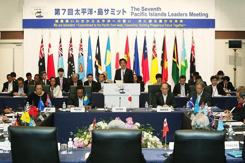 Japanese Prime Minister Shinzo Abe delivers an opening speech at the plenary session of the seventh Pacific Islad Leaders Meeting in Iwaki in Fukushima prefecture, northern Japan on May 23, 2015. -- PHOTO: AFP