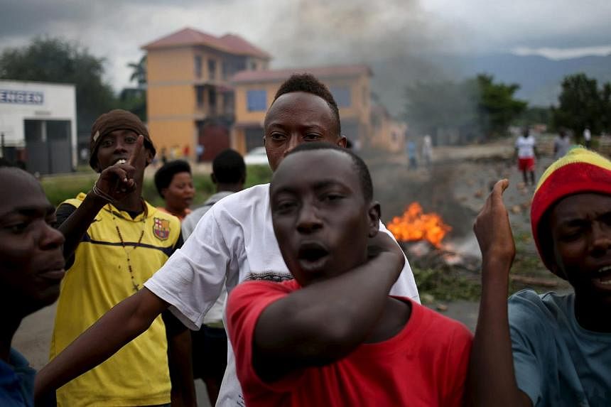 Protesters shout during a protest against Burundi's President Pierre Nkurunziza and his bid for a third term in Bujumbura, Burundi, May 22, 2015. -- PHOTO: REUTERS