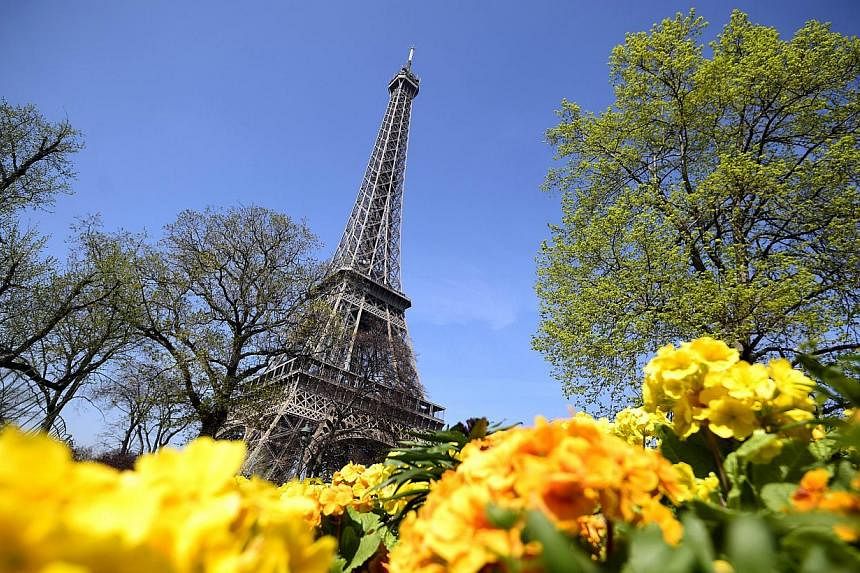 A file picture taken on April 8, 2015, shows a view of the Eiffel Tower. Paris' iconic Eiffel Tower was shut to tourists on May 22, 2015, as staff walked off the job to protest a surge in gangs of pickpockets roaming around the monument. -- PHOTO: AF