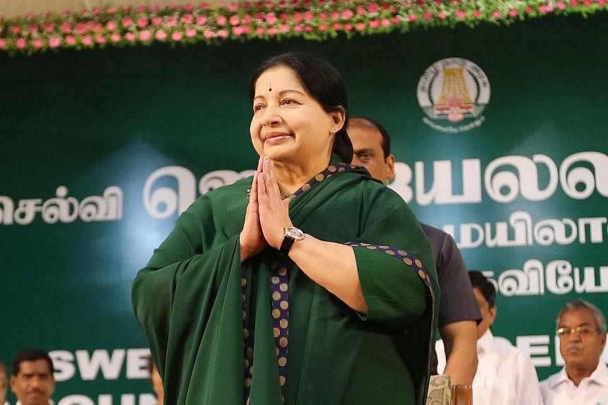 Chief of the All India Anna Dravida Munnetra Kazhagam party Jayalalithaa Jayaram gestures during her swearing-in ceremony as the chief minister of the southern state of Tamil Nadu in Chennai on May 23, 2015. -- PHOTO: AFP