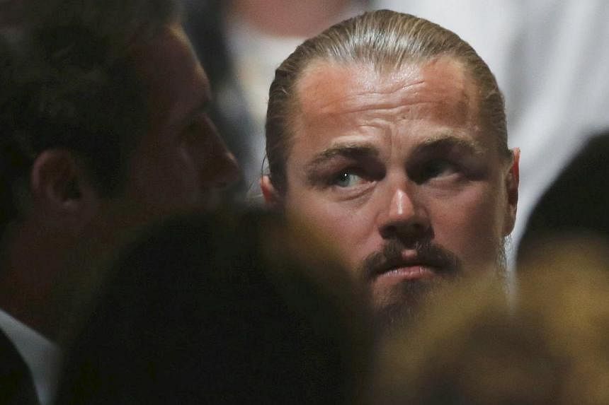 US actor Leonardo DiCaprio reacts during&nbsp;the Cannes Aids fund-raiser on May 21, 2015. -- PHOTO: REUTERS