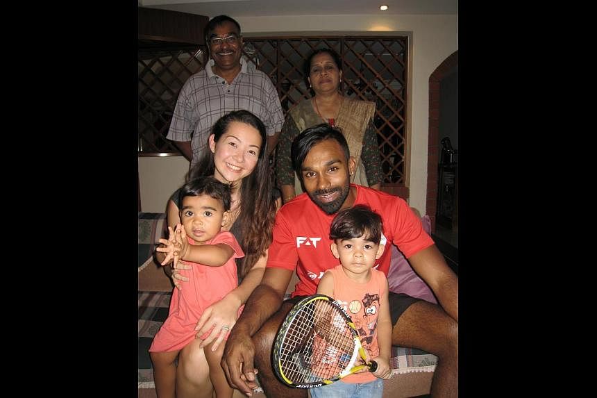 Singapore athlete Vivian Rhamanan (in red) with his wife, Ms Julia Shinozaki, and their children, Tia and Travis. Standing behind are his father, Mr Rhamanan Govindan Kochuvathi, and mother, Mrs Beena Rhamanan.