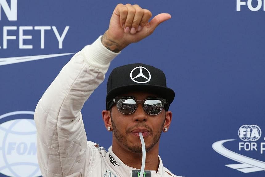 Defending world champion Lewis Hamilton is better for Formula One than either four-time title-holder Sebastian Vettel or Nico Rosberg, the sport's commercial supremo Bernie Ecclestone said on Sunday. -- PHOTO: REUTERS