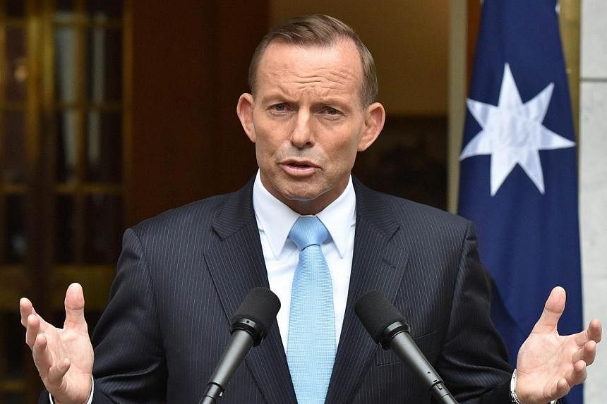 Australian Prime Minister Tony Abbott said on Sunday, May 24, 2015, that the country is set to introduce new counter-terrorism laws, which includes stripping dual nationals who are linked to terrorism of their citizenship. -- PHOTO: AFP