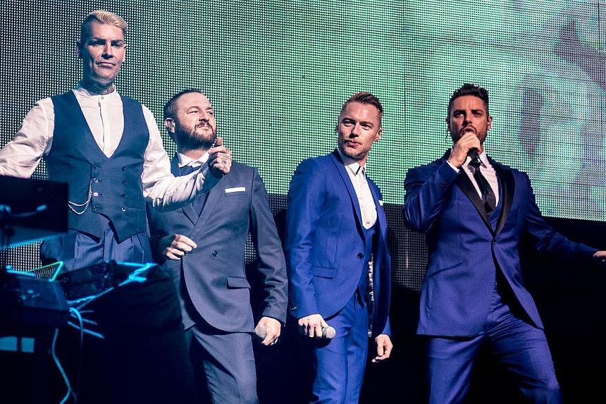 The Boyzone quartet of (from left) Shane Lynch, Michael Graham, Ronan Keating and Keith Duffy. -- PHOTO: MARCUS LIN&nbsp;