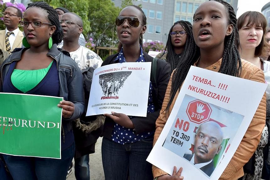 People take part in a protest against Burundi President Pierre Nkurunziza and his bid for a third term, in Brussels, Belgium, May 23, 2015. -- PHOTO: REUTERS