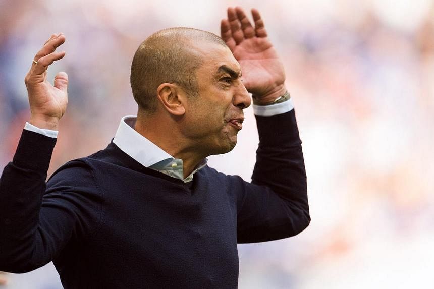 Schalke's Italian head coach Roberto di Matteo reacts during the German first division Bundesliga football match between FC Schalke 04 and VfB Stuttgart at the Veltins-Arena in Gelsenkirchen, western Germany, on May 2, 2015. -- PHOTO: AFP