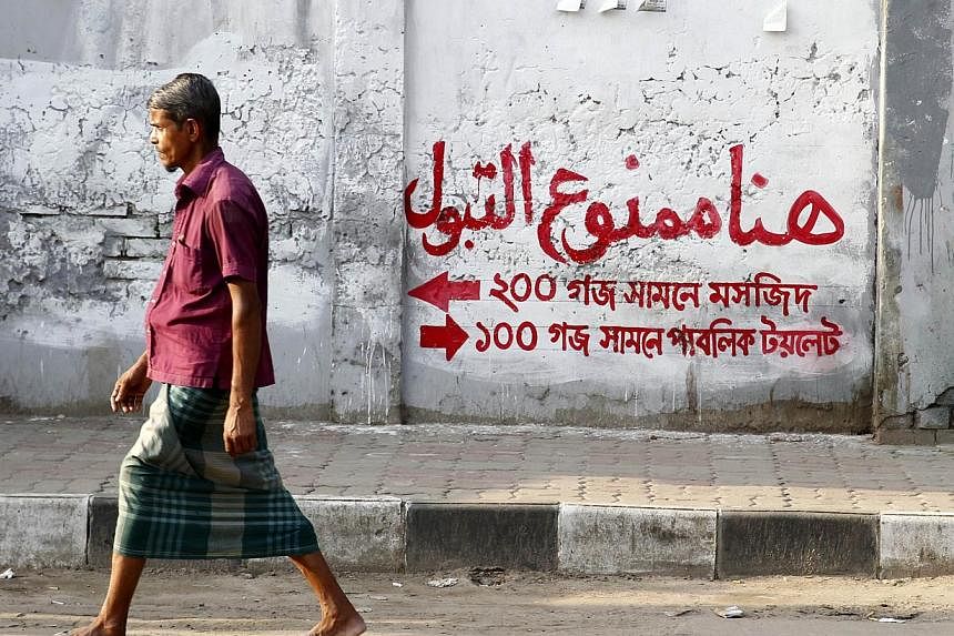 Dhaka's walls have been peppered with signs warning "Do not urinate here!" in Arabic, in the hope that people will not defile a script they see as holy, even though few Bangladeshis understand the language.