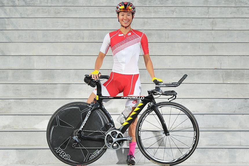 Singapore cyclist and 2013 SEA Games Gold medalist Dinah Chan, 29, has announced she is ready to defend her gold medal at the SEA Games next month.&nbsp;-- ST PHOTO:&nbsp;LIM YAOHUI FOR THE STRAITS TIMES