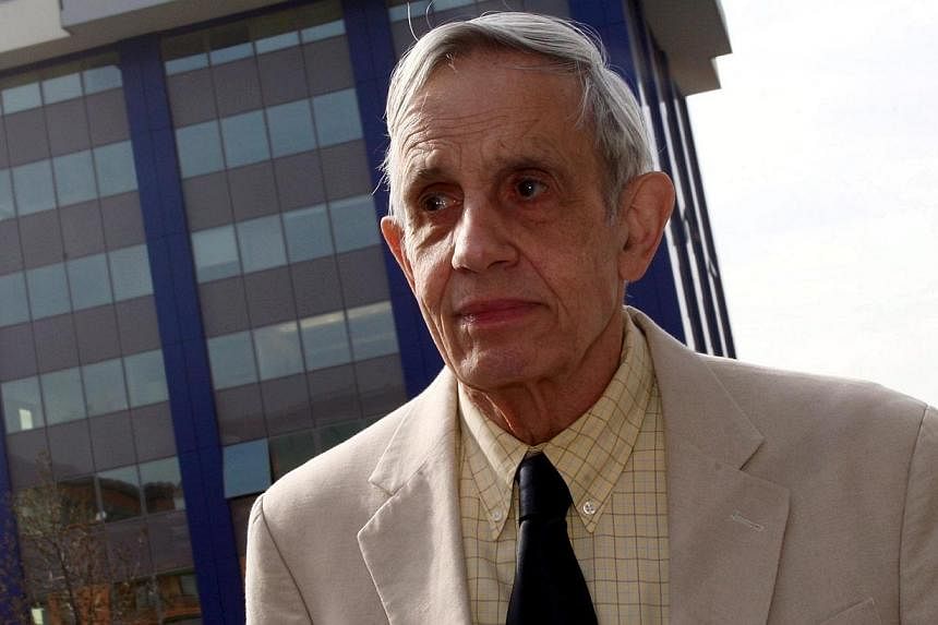 A file picture dated March 18, 2008, of Nobel Laureate, US mathematician John Nash attending a Meeting For Extraordinary Minds in Brescia, Italy. His life story was the basis for the Hollywood film A Beautiful Mind. -- PHOTO: EPA&nbsp;