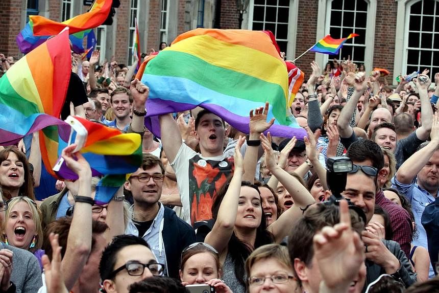 Supporters reacting outside Dublin Castle following the announcement of the result of the same-sex marriage referendum in Dublin, Ireland, on May 23, 2015. -- PHOTO: AFP&nbsp;